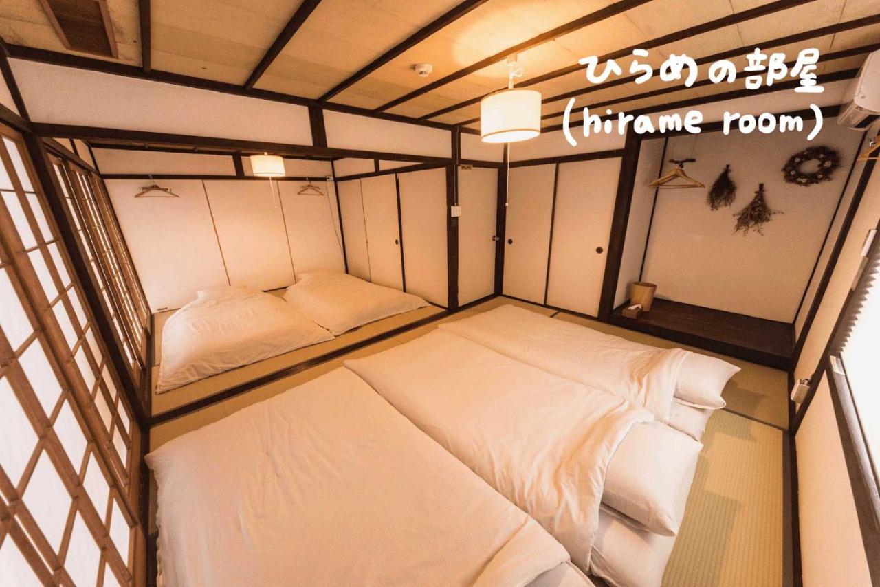 Book & Guesthouse Hitotomaru Toyooka  Rum bild